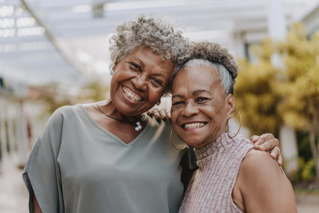 2 senior woman and hugging at Sagewood, a luxury retirement community offering Type A CCRC contracts for Lifecare in Phoenix, AZ.