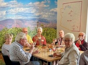 residents enjoying wine