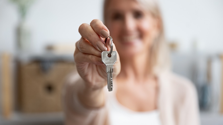 holding keys to the independent living apartment